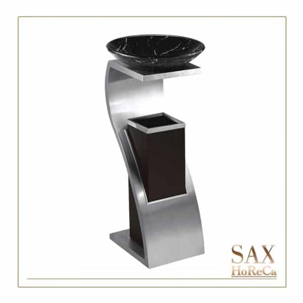 Skulptura sa funkcijom održavanja čistoće – stvorena je da stoji na vidnom mestu jer čistoća inoxa, luksuz stakla sa imitacijom mermera i sveukupan dizajn prijaju oku uz ulepšavanje enterijera. Idealna je za ulaze, terase, pušačke zone, lobije, poslovne i javne prostore.